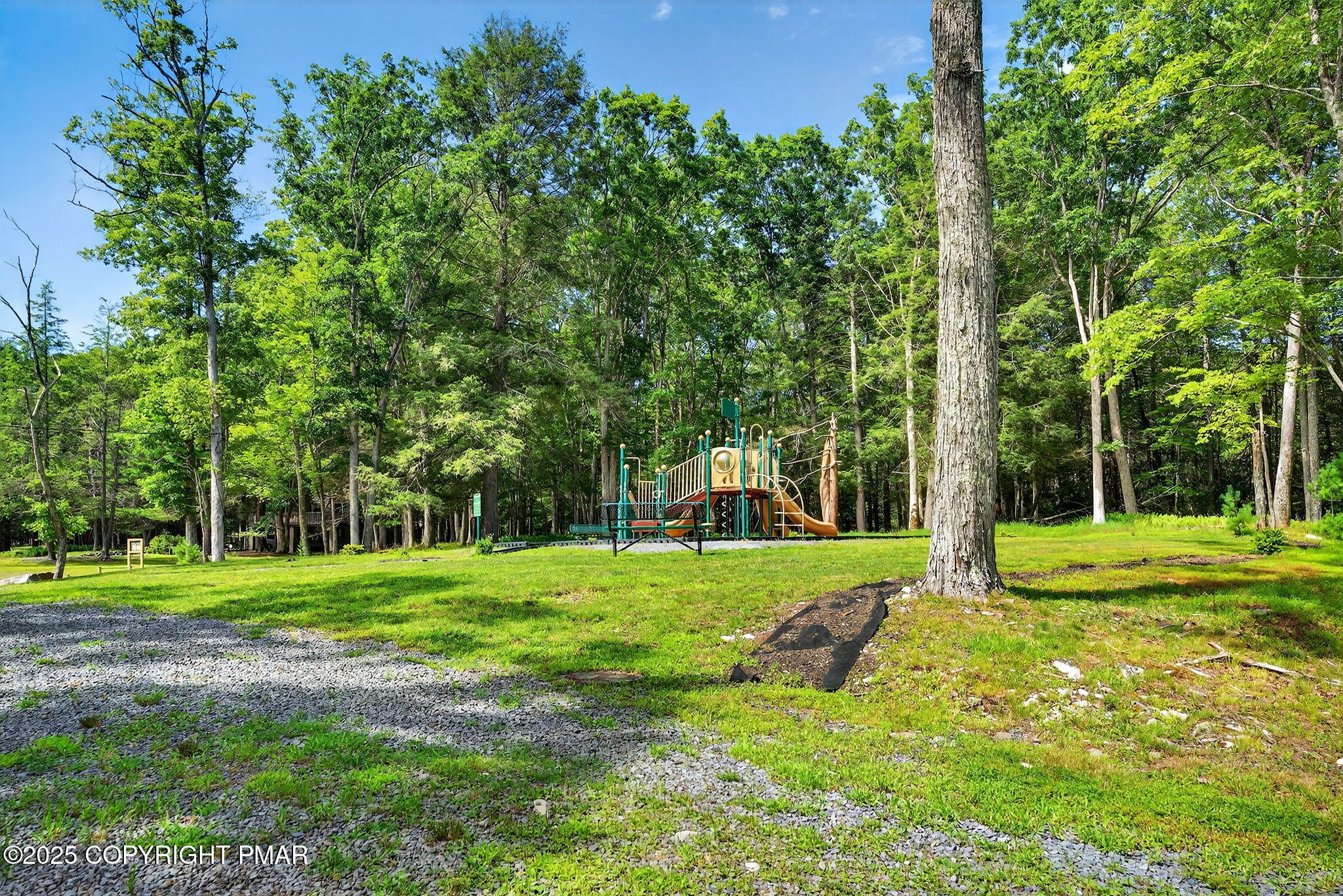 375 Marcel Drive Dingmans Ferry, PA 18328 - Photo 22 of 25 a view of a park with large trees