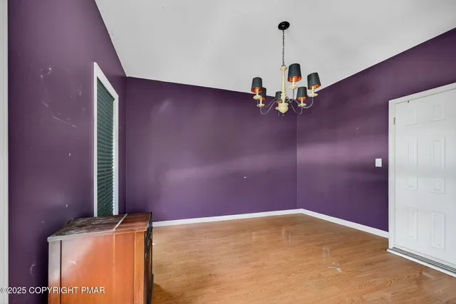 a view of a room with a chandelier