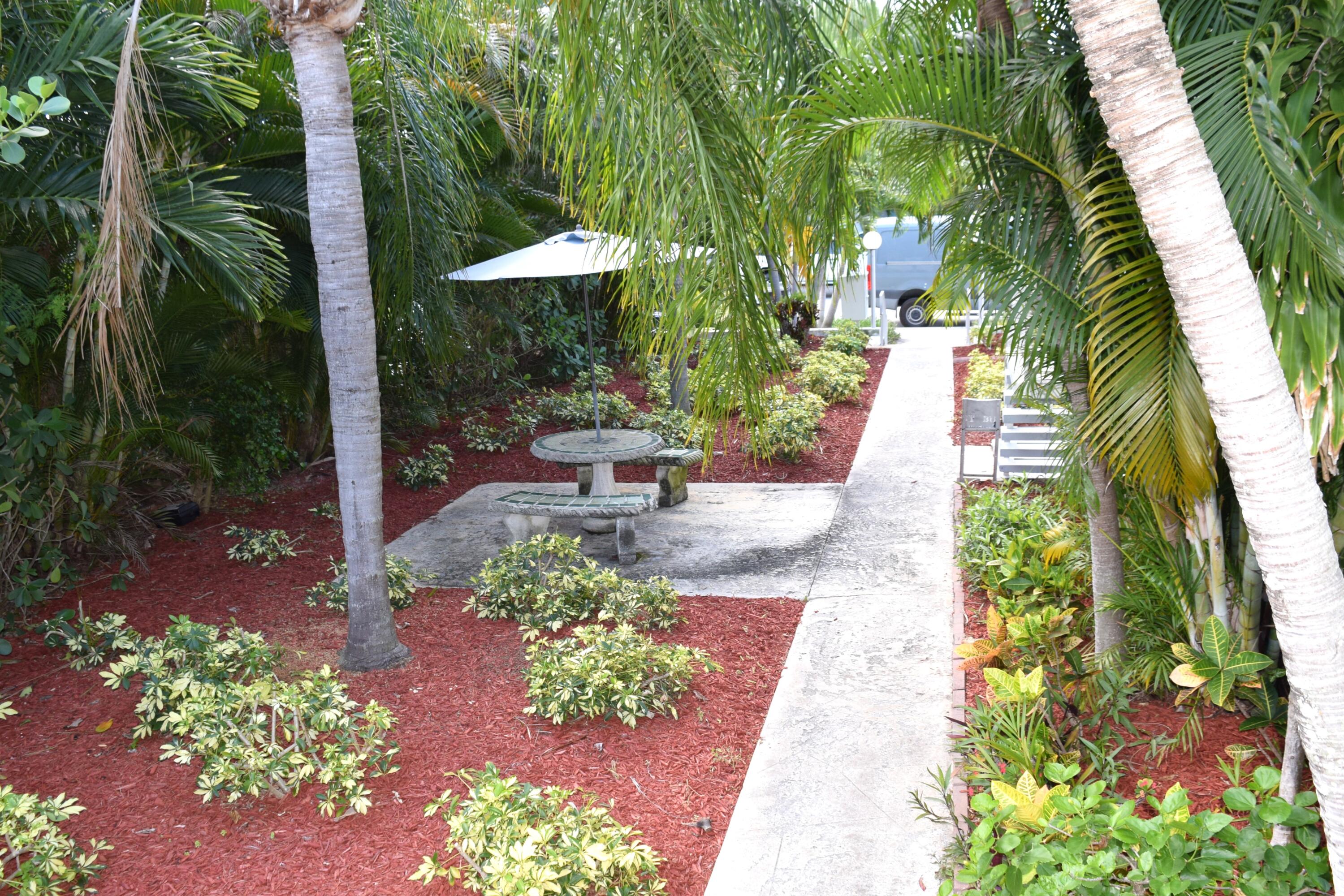 710 North K Street, Unit 203 Lake Worth Beach, FL 33460 - Photo 14 of 17 walk way