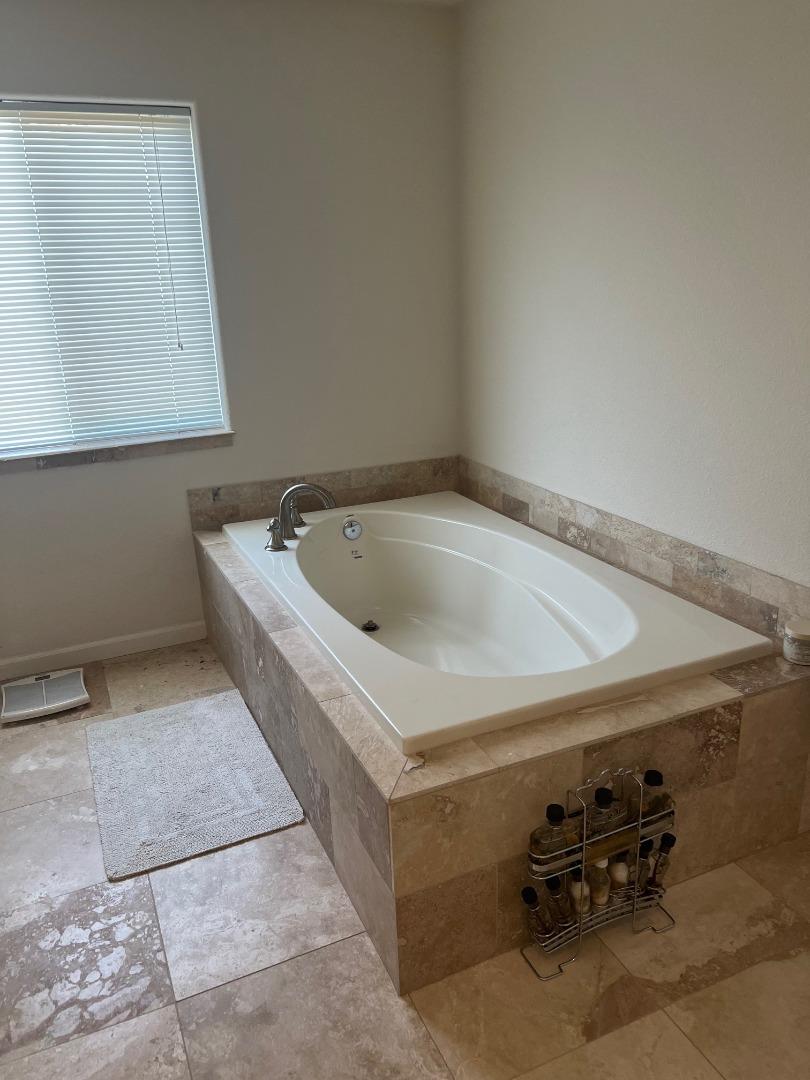 629 Poker Flat Road Copperopolis, CA 95228 - Photo 11 of 18 a utility room with a couch