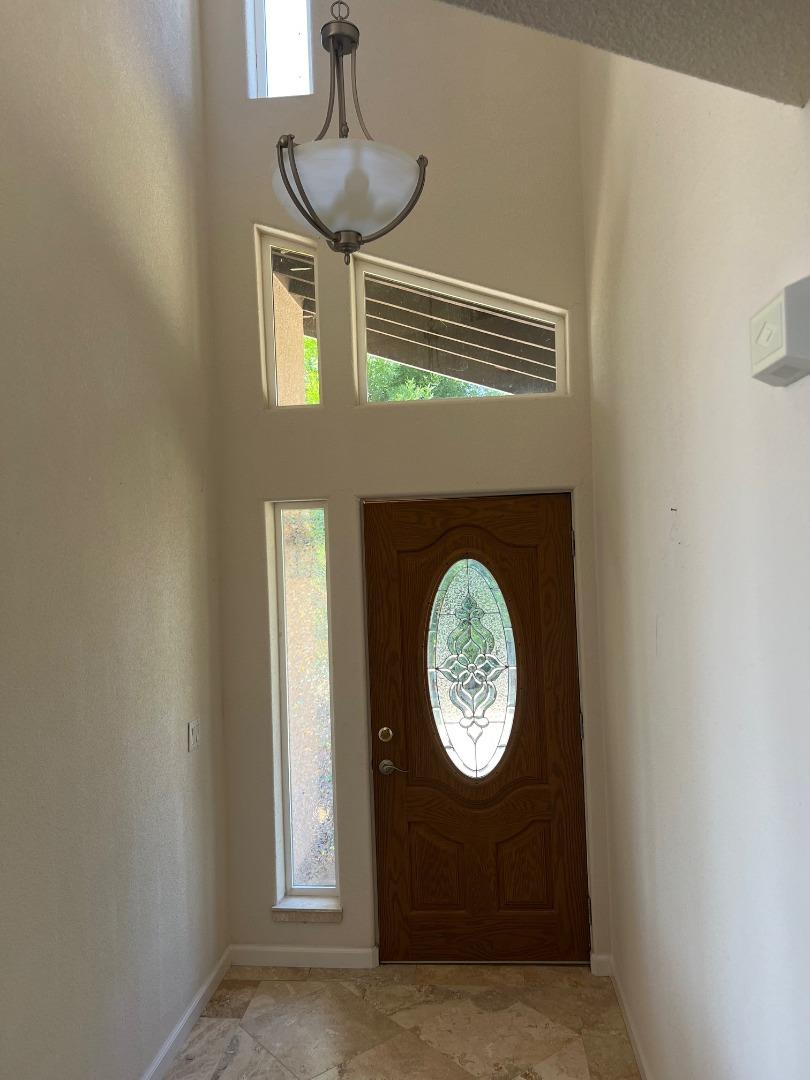 629 Poker Flat Road Copperopolis, CA 95228 - Photo 4 of 18 a view of a hallway with a small space