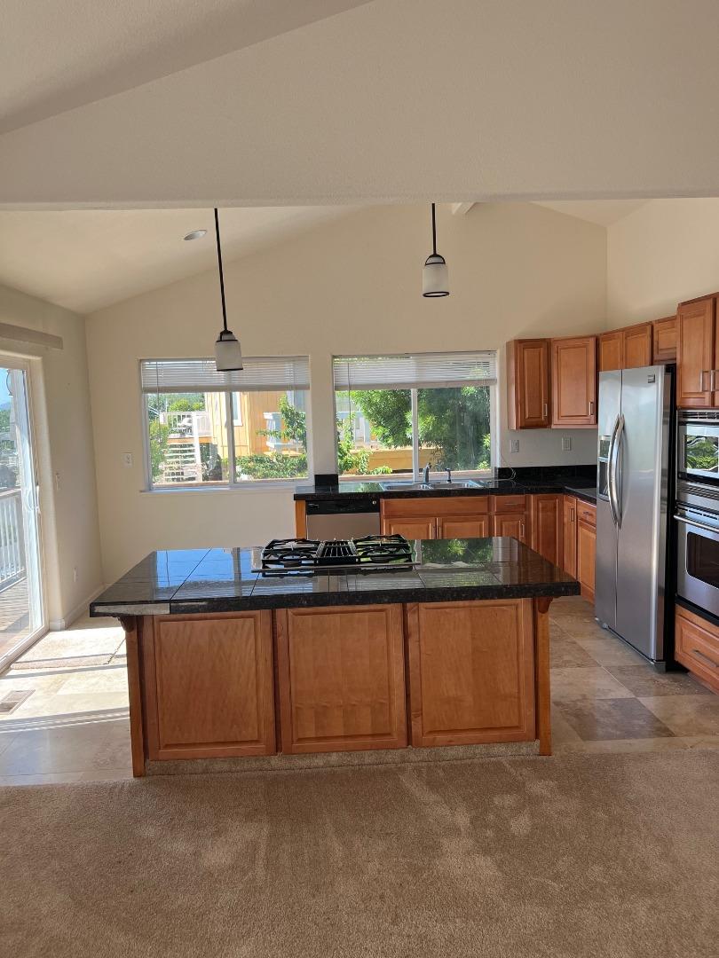 629 Poker Flat Road Copperopolis, CA 95228 - Photo 6 of 18 a living room with stainless steel appliances granite countertop furniture and a kitchen view