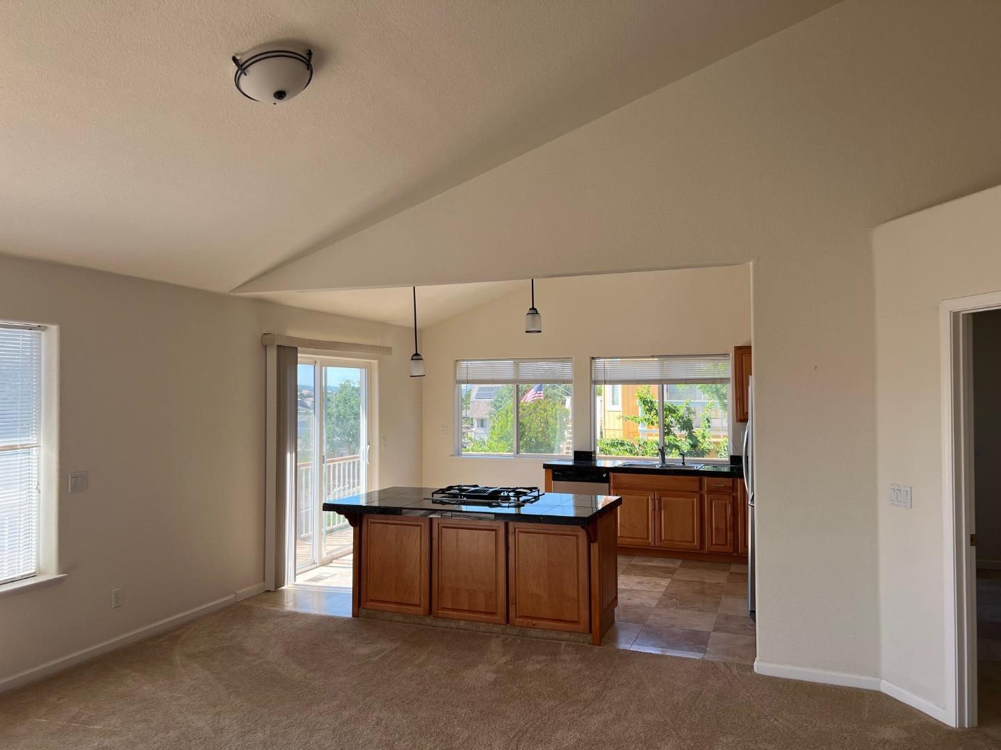 629 Poker Flat Road Copperopolis, CA 95228 - Photo 7 of 18 a large bathroom with a granite countertop sink and a large mirror