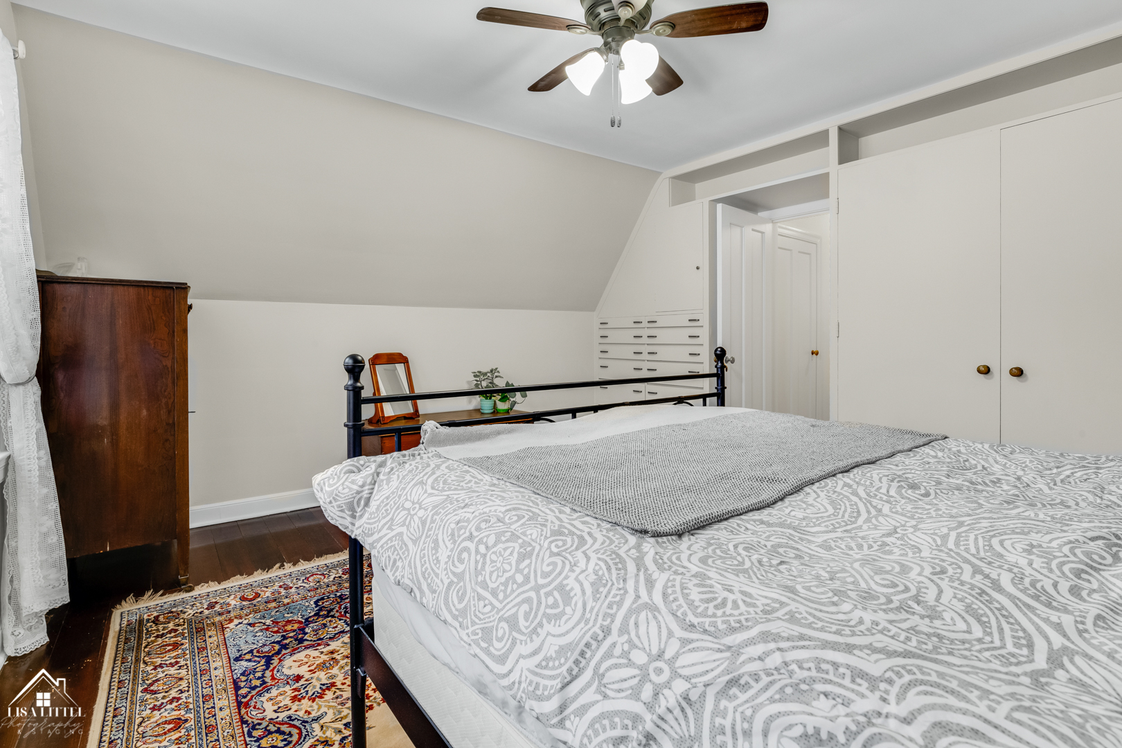 32W186 Army Trail Road Wayne, IL 60184 - Photo 17 of 27 a bedroom with a bed and a chandelier