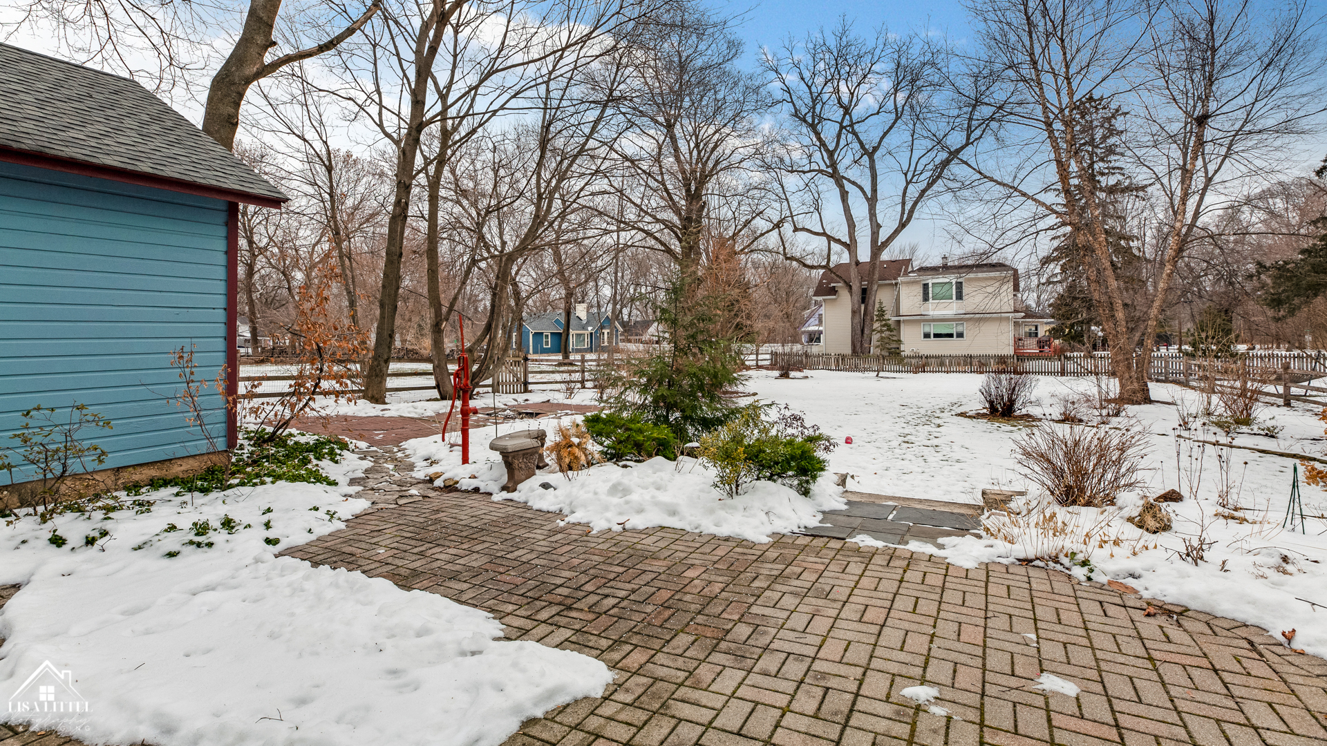 32W186 Army Trail Road Wayne, IL 60184 - Photo 24 of 27 a view of a yard with snow on the road