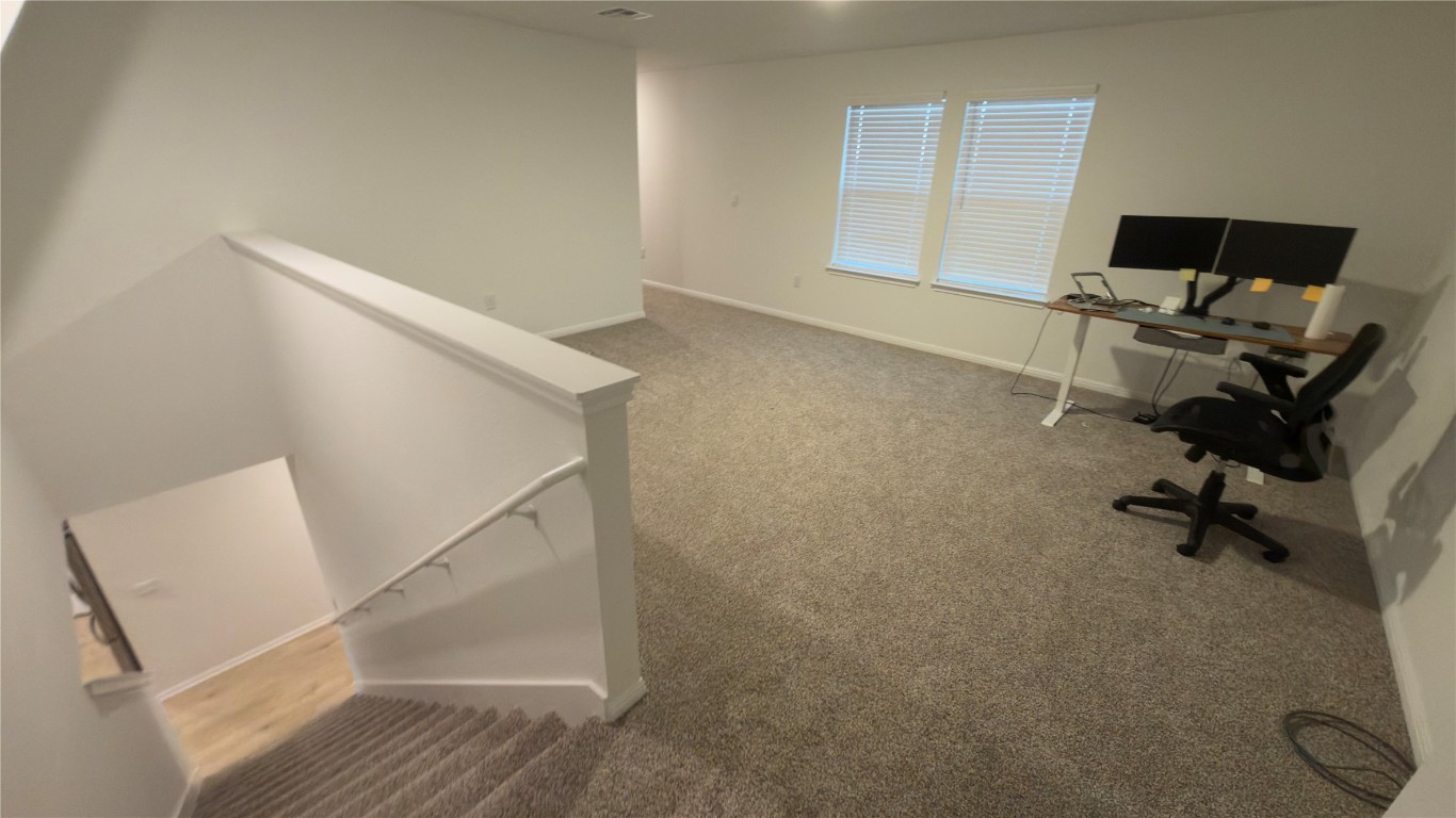 2512 Hackamore Drive Leander, TX 78641 - Photo 11 of 35 a view of entryway with workspace