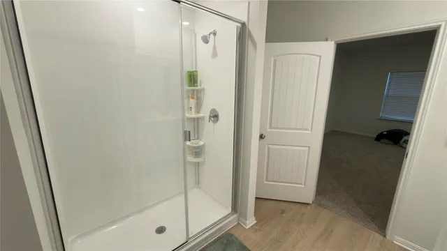 a bathroom with a sink and mirror