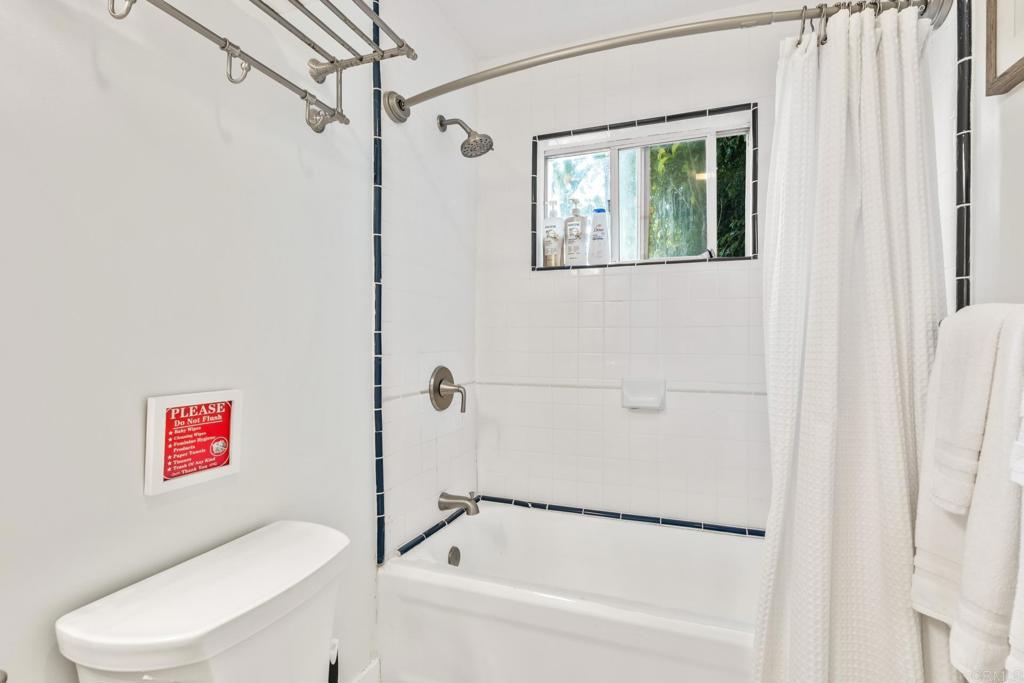 2432 3rd Street Santa Monica, CA 90405 - Photo 24 of 62 a white toilet sitting next to a bath tub shower