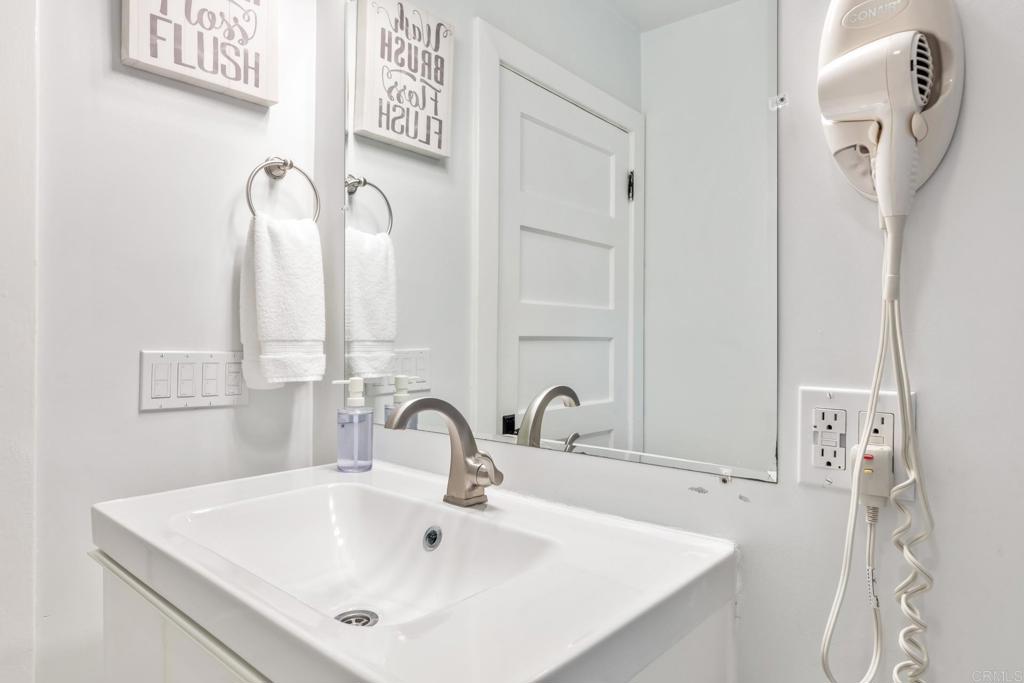 2432 3rd Street Santa Monica, CA 90405 - Photo 27 of 62 a bathroom with a sink and a mirror