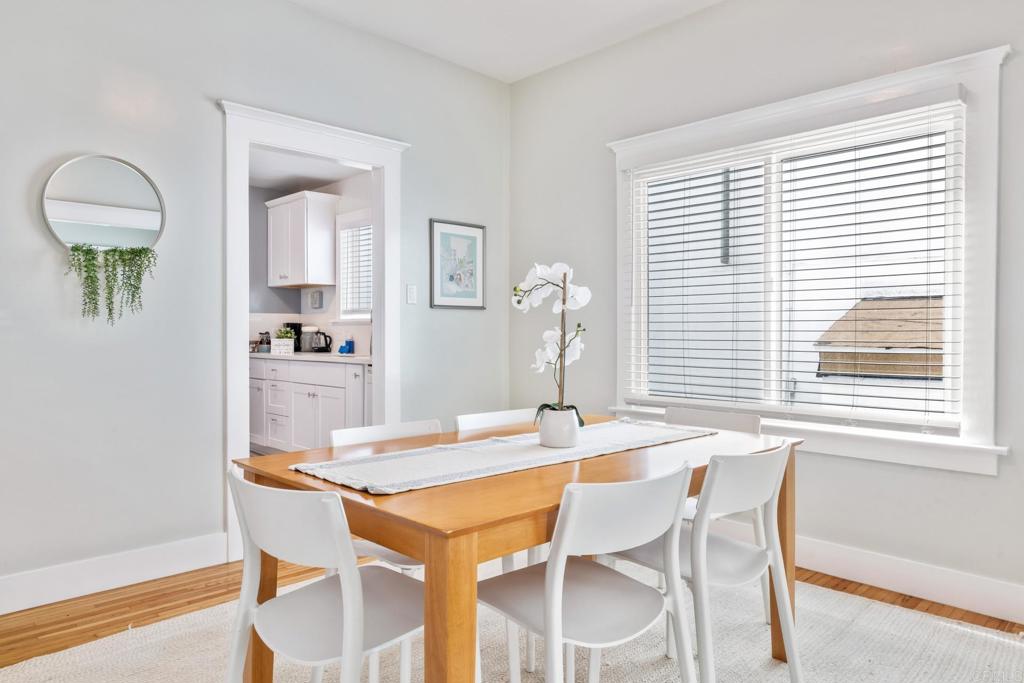 2432 3rd Street Santa Monica, CA 90405 - Photo 29 of 62 a view of a dining room with furniture and wooden floor