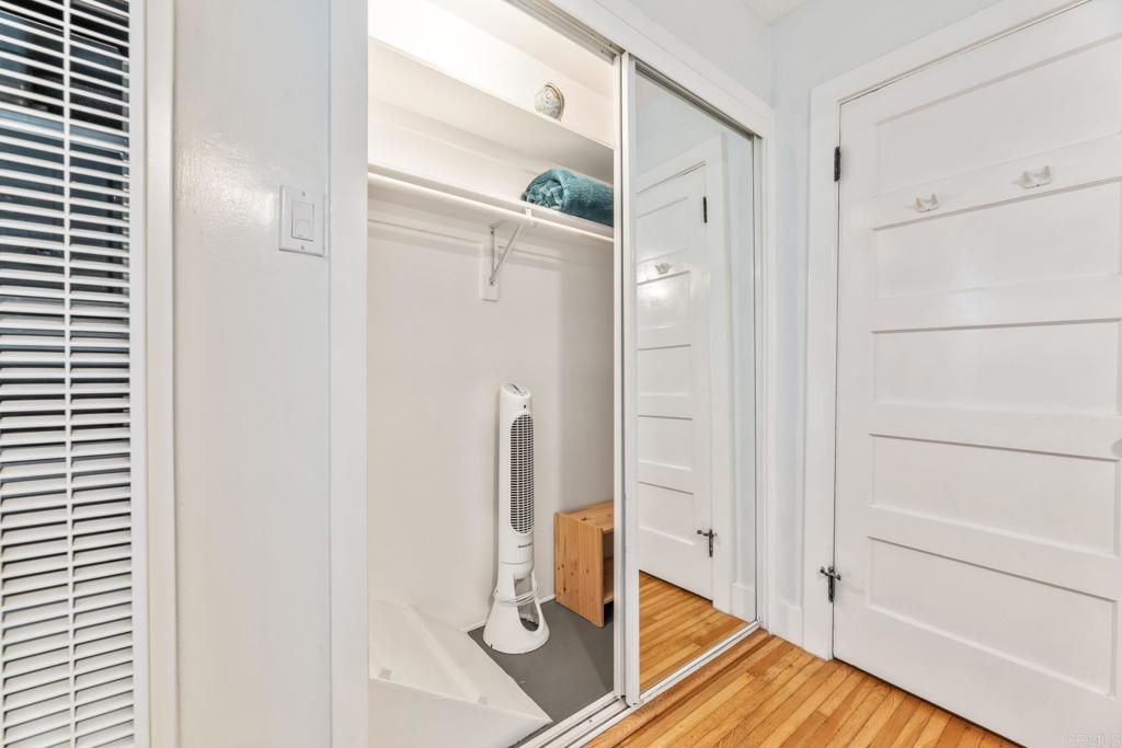 2432 3rd Street Santa Monica, CA 90405 - Photo 3 of 62 a bathroom with a glass shower door and a mirror