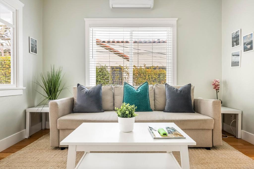2432 3rd Street Santa Monica, CA 90405 - Photo 34 of 62 a living room with furniture potted plant and a window