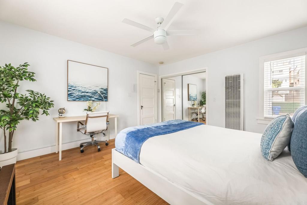 2432 3rd Street Santa Monica, CA 90405 - Photo 41 of 62 a spacious bedroom with a bed and a table in it