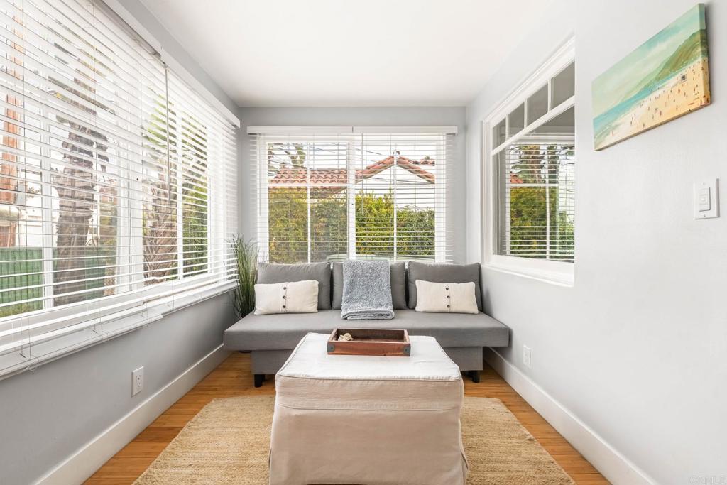 2432 3rd Street Santa Monica, CA 90405 - Photo 47 of 62 a living room with furniture and large windows