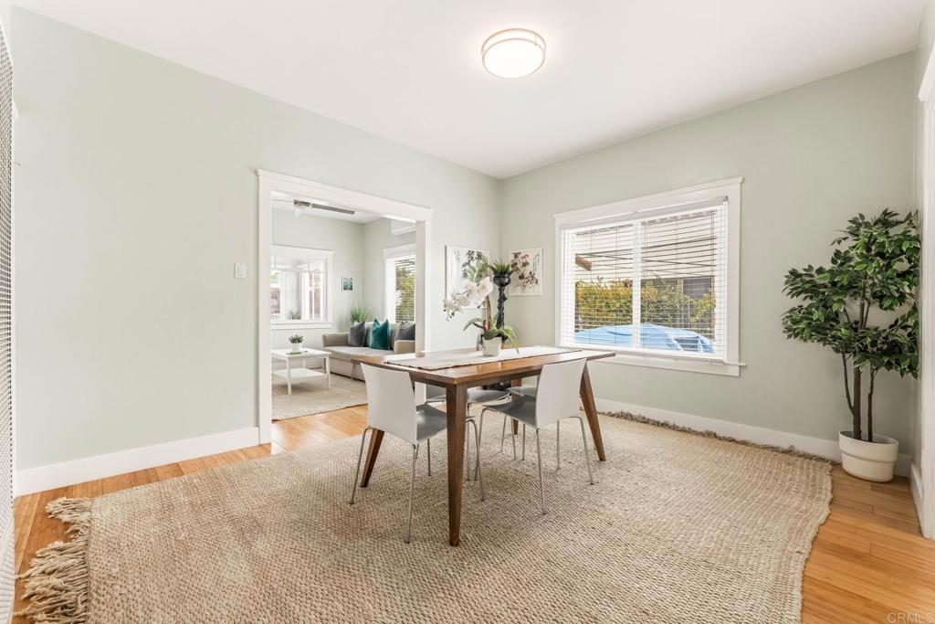 2432 3rd Street Santa Monica, CA 90405 - Photo 50 of 62 a dining room with a wooden table and chairs