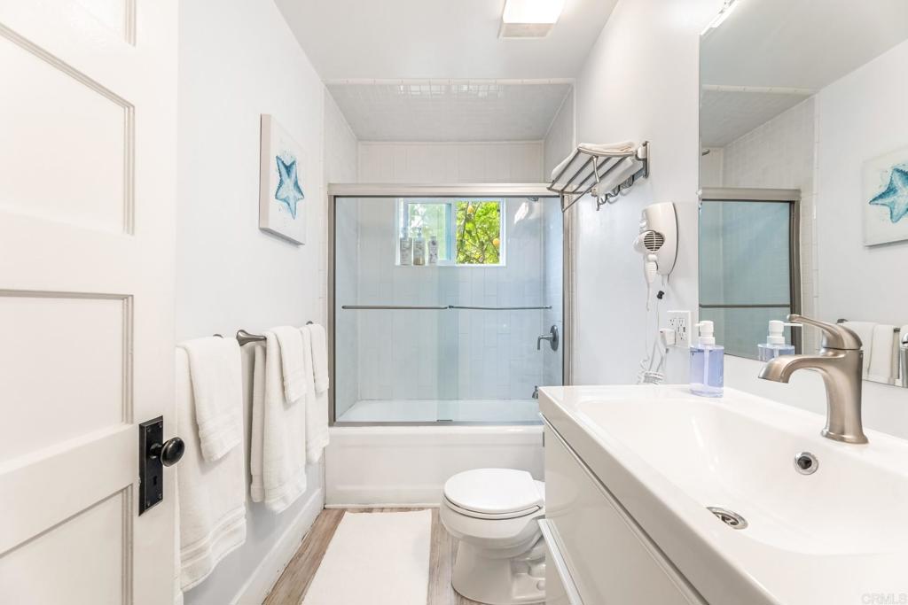 2432 3rd Street Santa Monica, CA 90405 - Photo 54 of 62 a bathroom with a sink toilet and shower