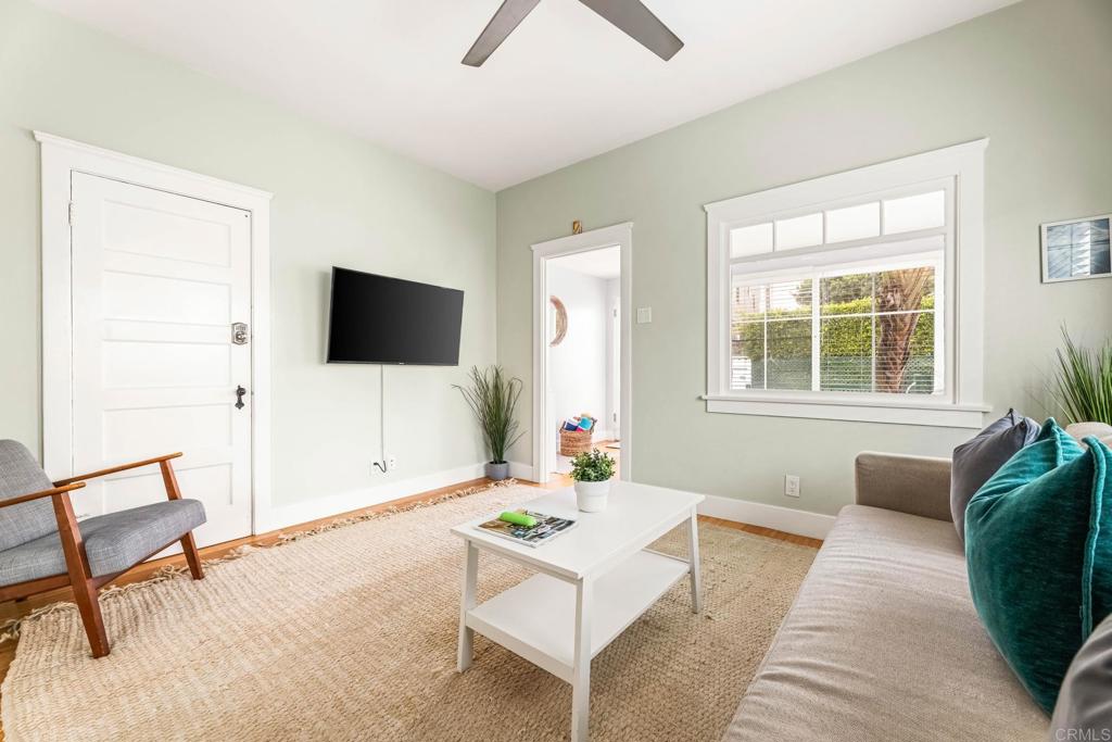 2432 3rd Street Santa Monica, CA 90405 - Photo 58 of 62 a living room with furniture and a flat screen tv