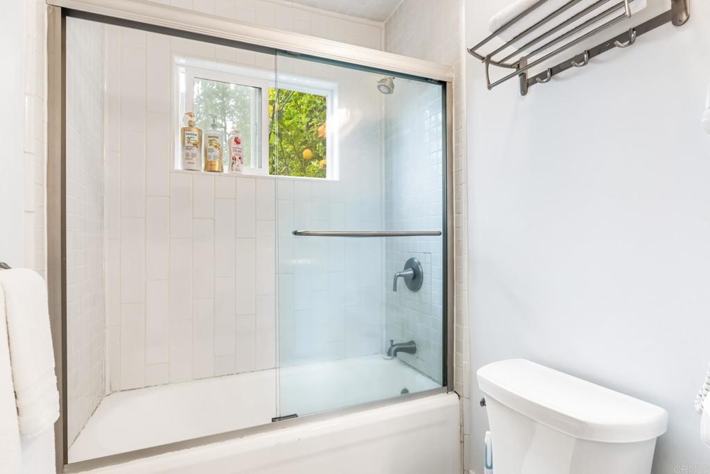 2432 3rd Street Santa Monica, CA 90405 - Photo 60 of 62 a white bath tub sitting next to a toilet