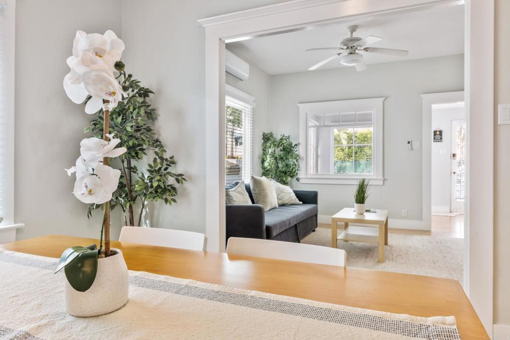 2432 3rd Street Santa Monica, CA 90405 - Photo 8 of 62 a living room with furniture and a chandelier