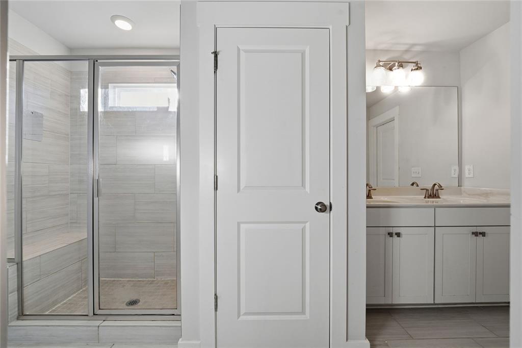 4806 Anvil Court Jefferson, GA 30549 - Photo 15 of 31 a bathroom with a shower and a sink