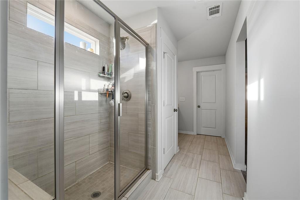 4806 Anvil Court Jefferson, GA 30549 - Photo 16 of 31 a bathroom with a shower and a sink