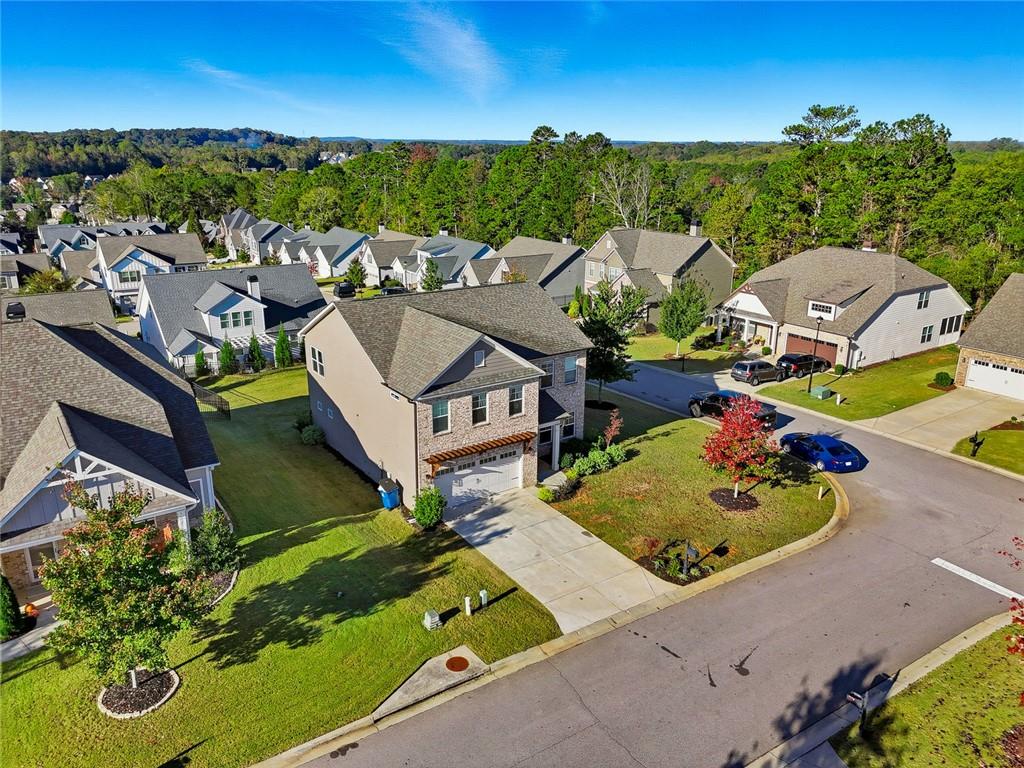 4806 Anvil Court Jefferson, GA 30549 - Photo 24 of 31 an aerial view of a house with garden space and street view