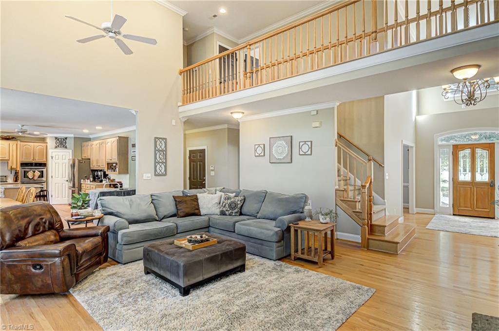5401 Leytonstone Court Oak Ridge, NC 27310 - Photo 10 of 41 Additional great room view with catwalk overlooking.