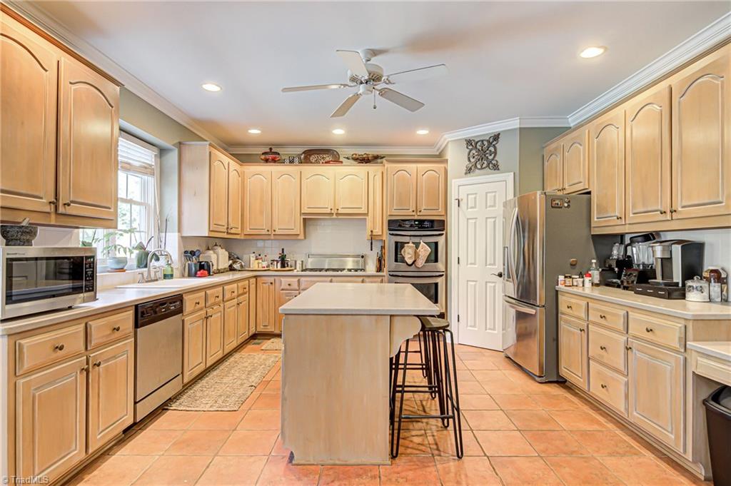 5401 Leytonstone Court Oak Ridge, NC 27310 - Photo 12 of 41 Large and spacious gourmet kitchen perfect for entertaining!