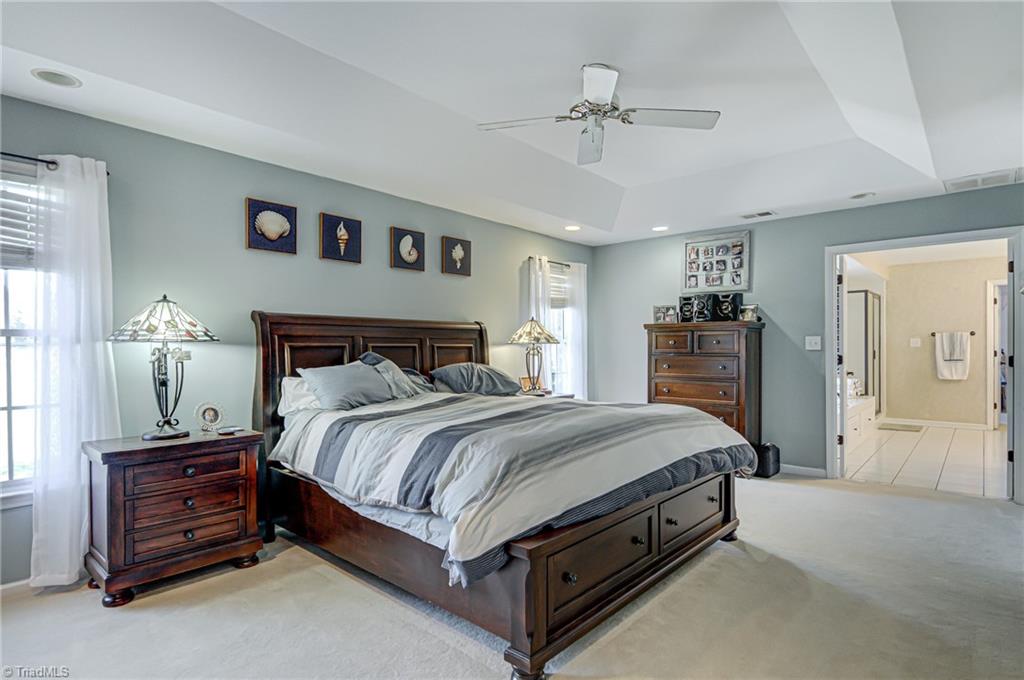 5401 Leytonstone Court Oak Ridge, NC 27310 - Photo 20 of 41 Trey ceiling with recessed lighting.