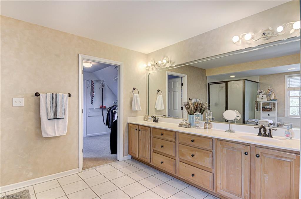 5401 Leytonstone Court Oak Ridge, NC 27310 - Photo 22 of 41 Master Bath is spacious with all new fixtures and hardware.