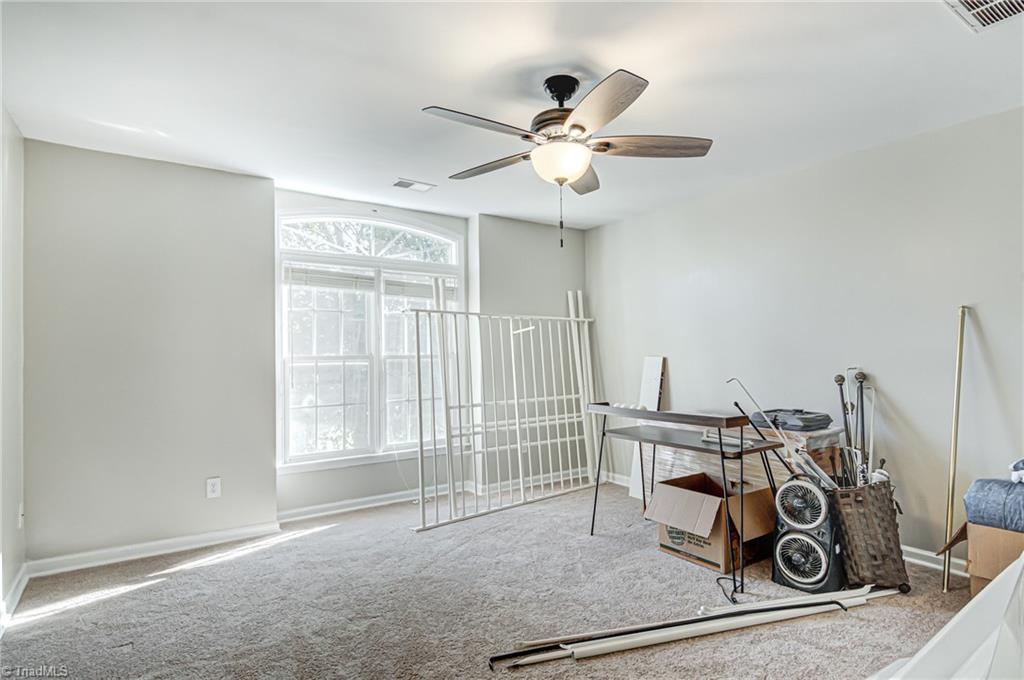 5401 Leytonstone Court Oak Ridge, NC 27310 - Photo 25 of 41 2nd Bedroom with new paint and carpet.