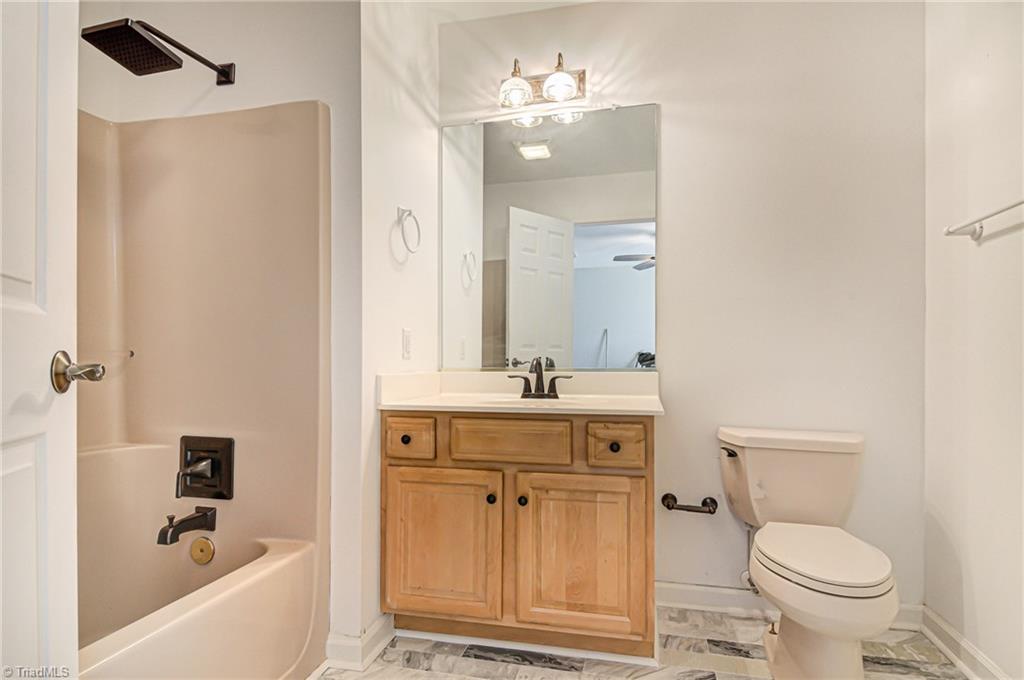 5401 Leytonstone Court Oak Ridge, NC 27310 - Photo 26 of 41 2nd Bedroom has full bath with new fixtures and hardware.