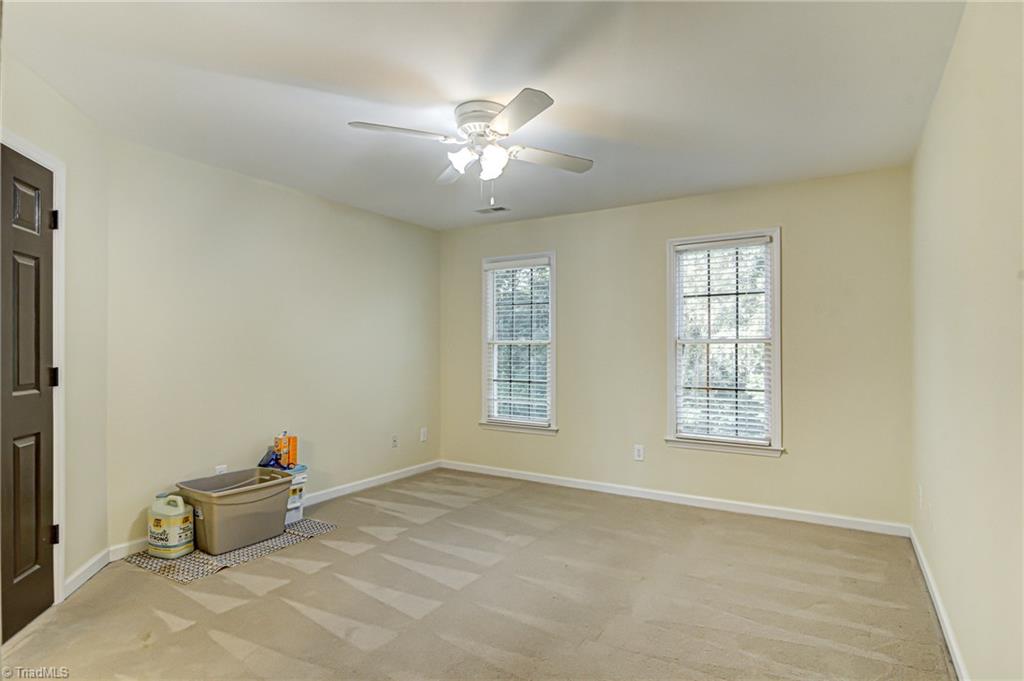 5401 Leytonstone Court Oak Ridge, NC 27310 - Photo 31 of 41 4th Bedroom with walk in closet and shares Jack N Jill bath.