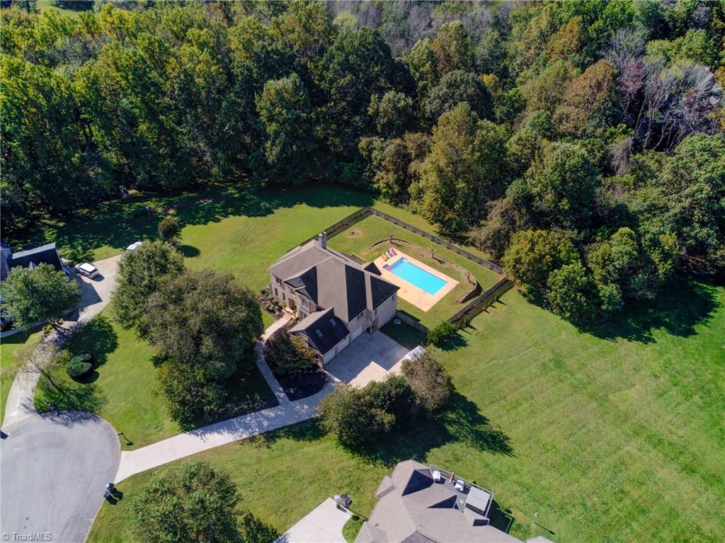 5401 Leytonstone Court Oak Ridge, NC 27310 - Photo 40 of 41 1.31 Acres backs up to wooded area to add to your privacy and located on a culdesac.