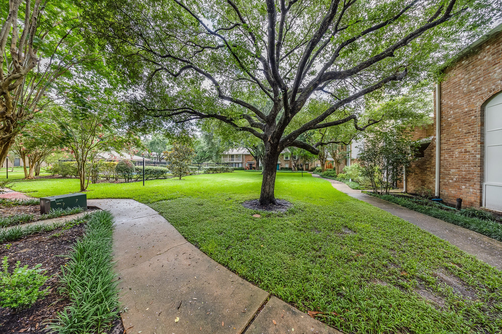 727 Bunker Hill Road, Unit 34 Houston, TX 77024 - Photo 9 of 38 Take in the beautiful community, that makes for a great first impression on the way over.