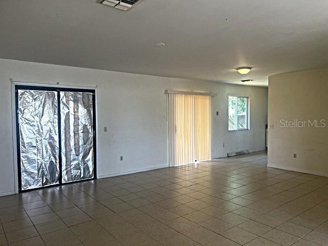 12 Pine Course Way Ocala, FL 34472 - Photo 4 of 29 an empty room with windows and closet
