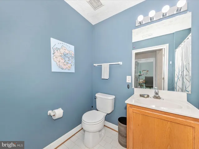 a view of a hallway with closet area