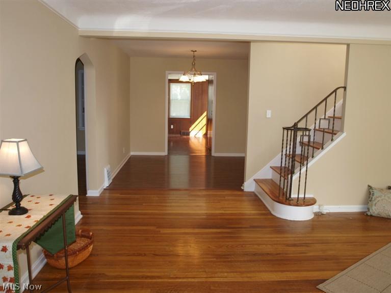 1577 Wood Road Cleveland, OH 44121 - Photo 3 of 25 View from front door through dining area to family room