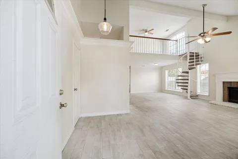 a view of a livingroom with a fireplace