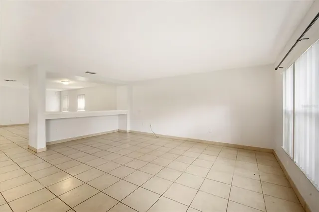 a view of an empty room and window