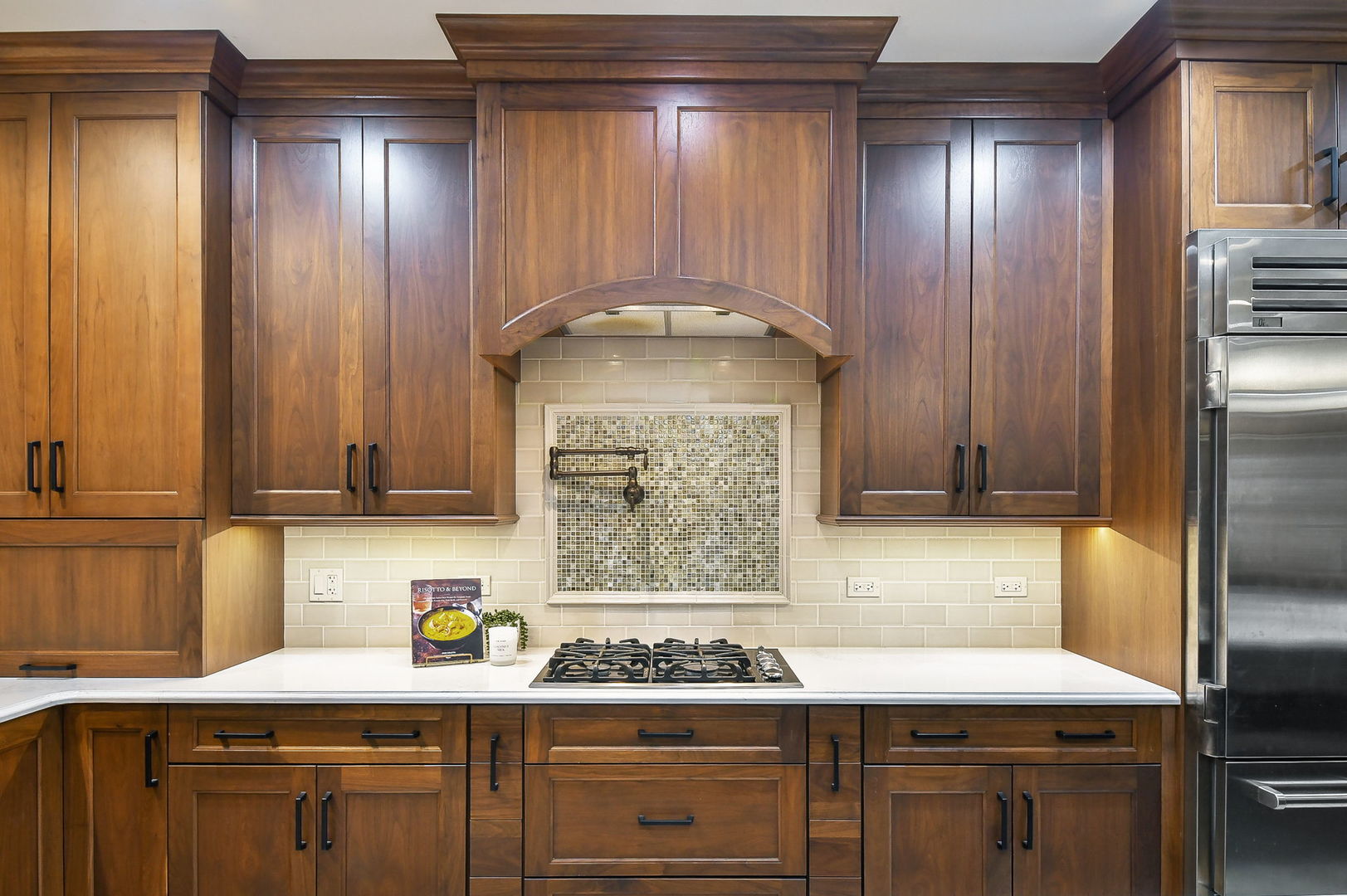 2009 Mackenzie Place, Unit 2009 Wheaton, IL 60187 - Photo 11 of 53 a kitchen with stainless steel appliances granite countertop a sink stove and refrigerator