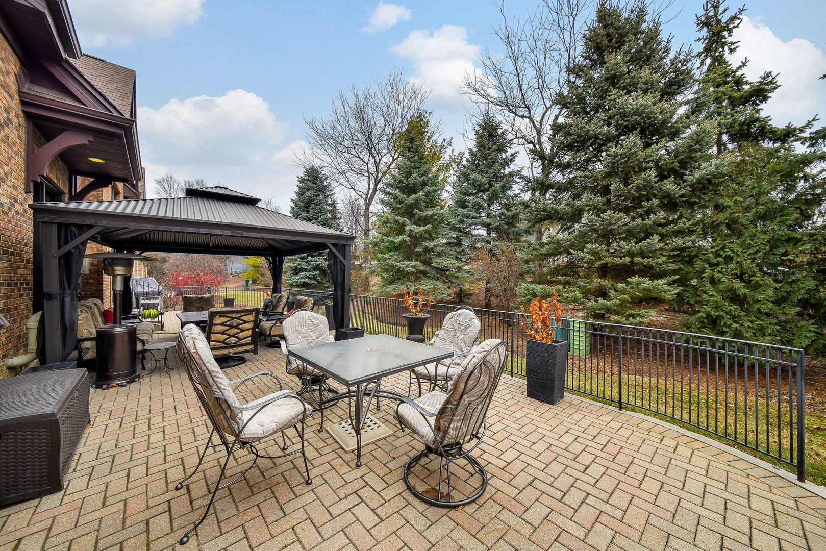 2009 Mackenzie Place, Unit 2009 Wheaton, IL 60187 - Photo 42 of 53 a view of a chairs and table in patio