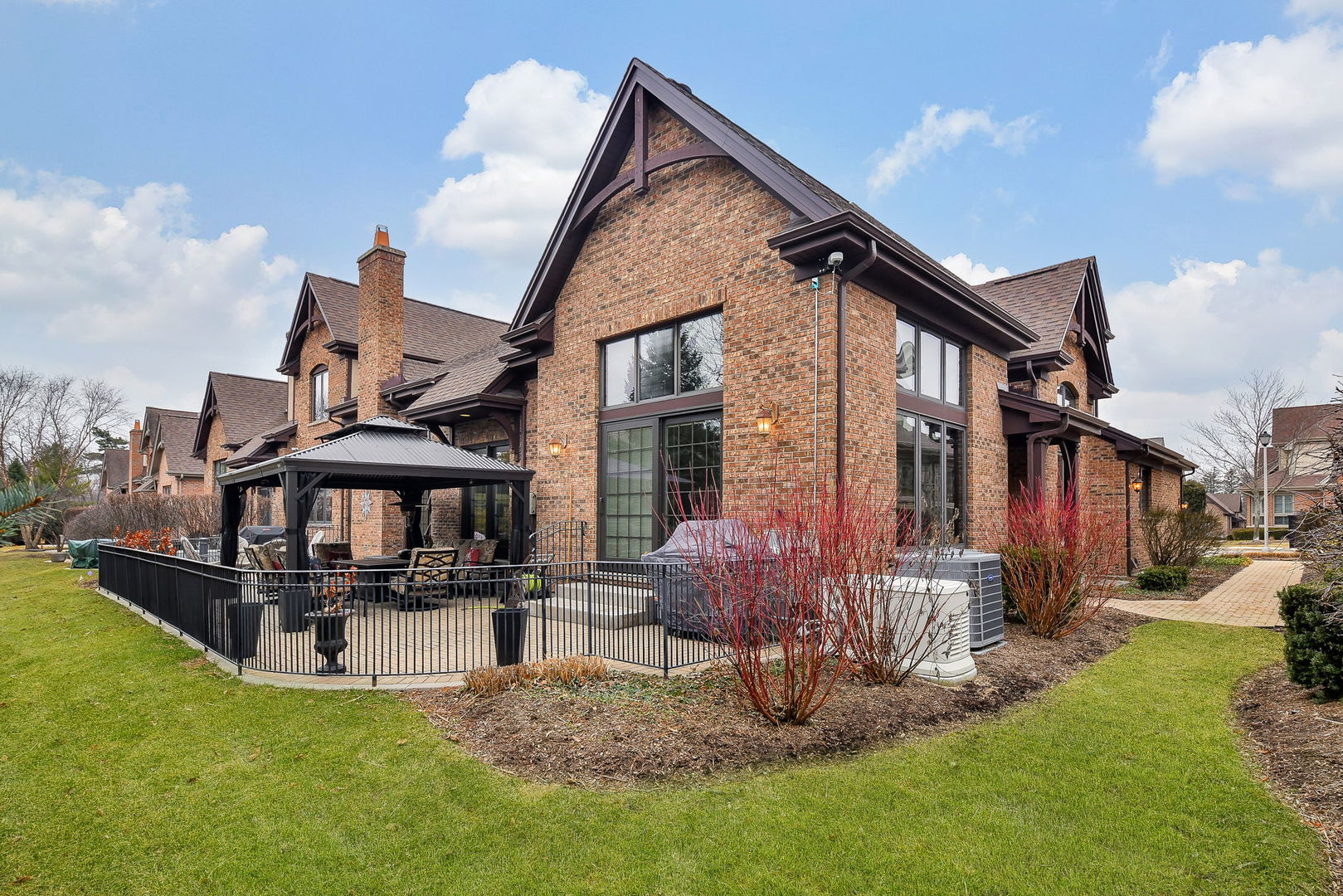 2009 Mackenzie Place, Unit 2009 Wheaton, IL 60187 - Photo 43 of 53 a view of a house with a big yard