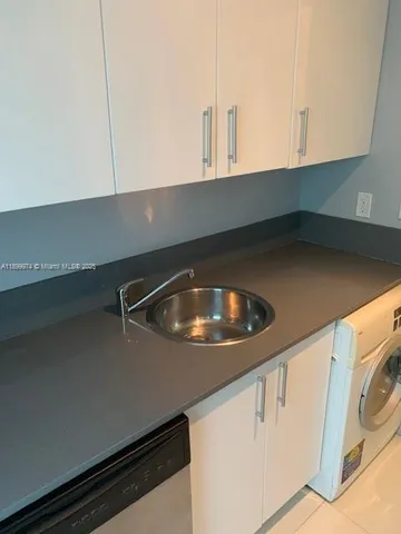 a close view of sink and stove