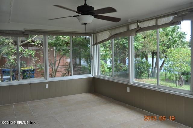 1711 Derringer Road Jacksonville, FL 32225 - Photo 12 of 25 a view of an empty room with a window