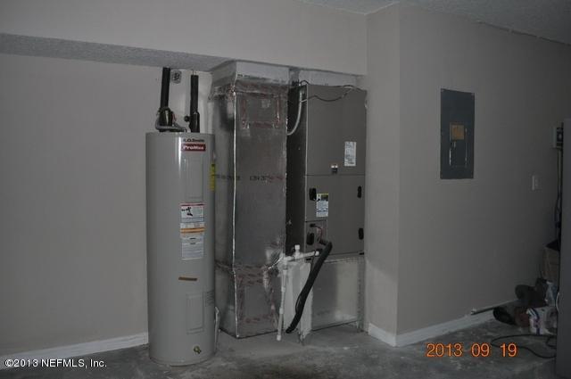 1711 Derringer Road Jacksonville, FL 32225 - Photo 10 of 25 a bathroom with a shower and a sink