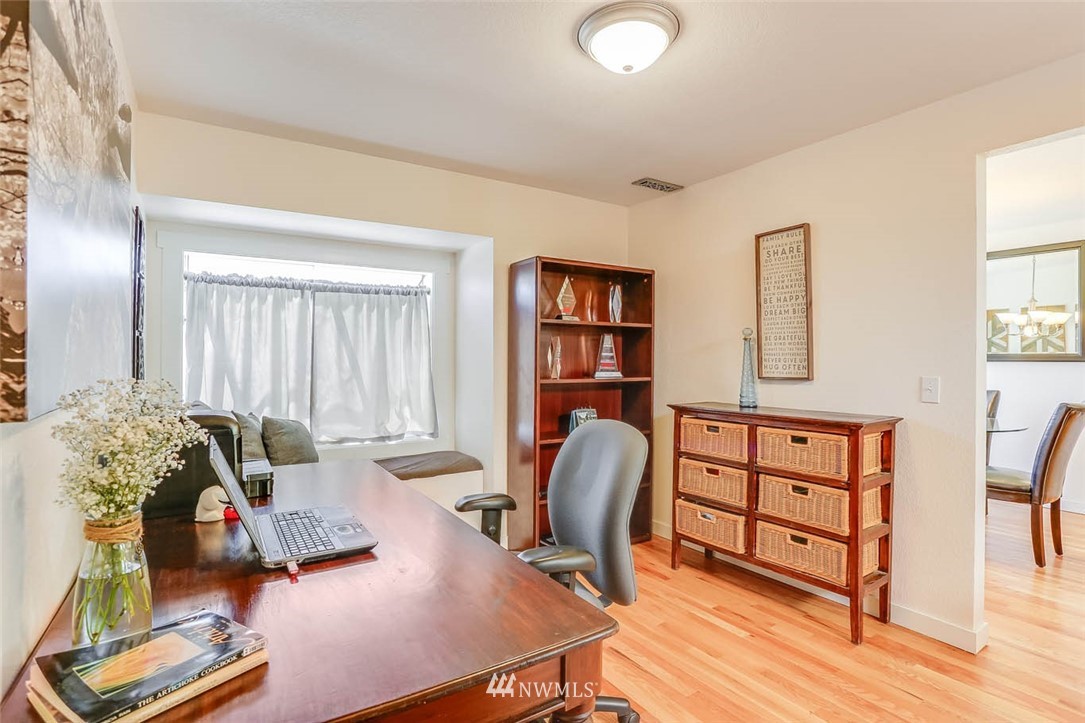 3522 Northeast 10th Place Renton, WA 98056 - Photo 11 of 34 a view of a workspace with furniture and a window