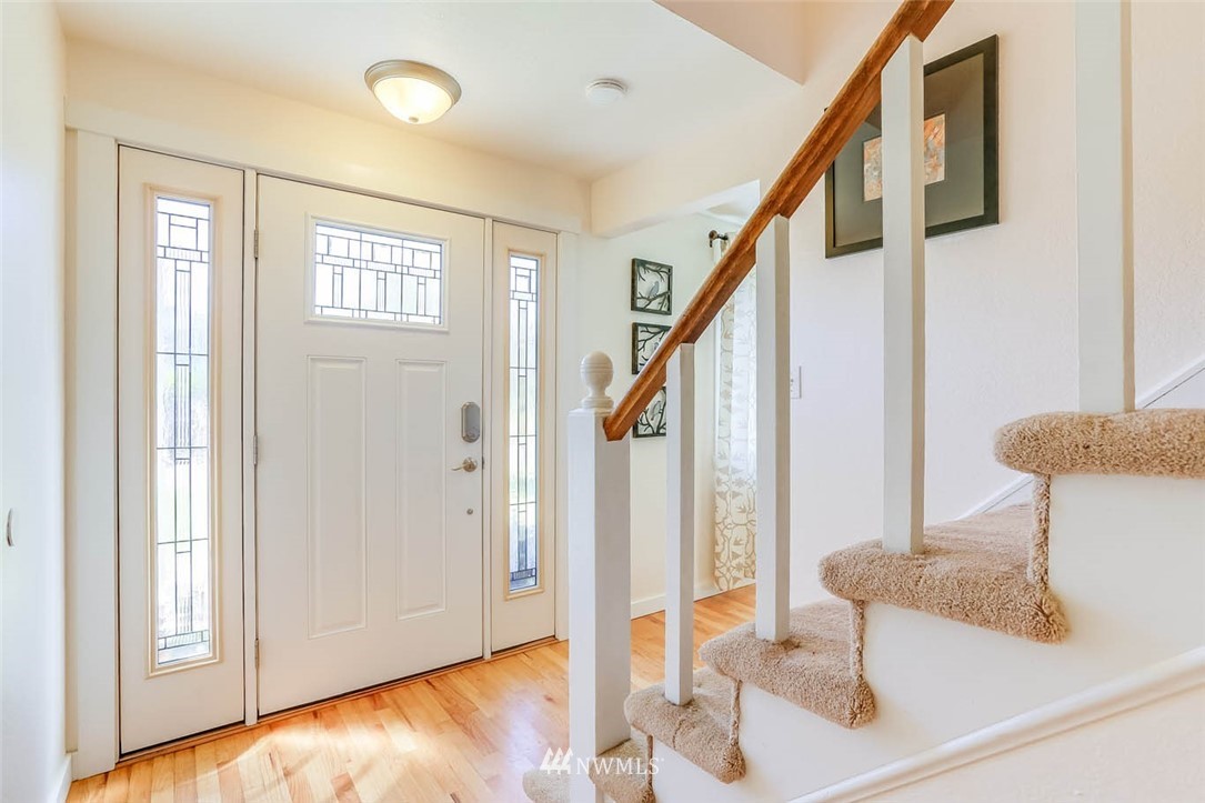 3522 Northeast 10th Place Renton, WA 98056 - Photo 3 of 34 a view of entryway and hall with wooden floor