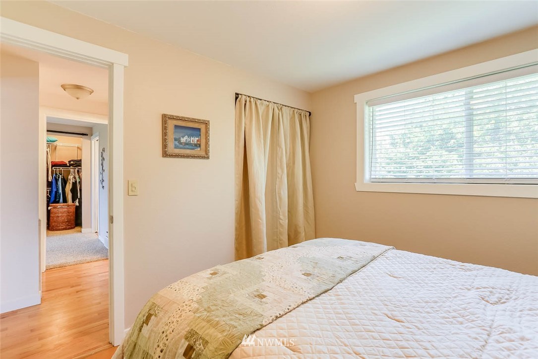 3522 Northeast 10th Place Renton, WA 98056 - Photo 23 of 34 a bedroom with a bed and a window