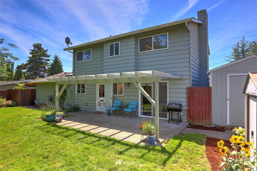 3522 Northeast 10th Place Renton, WA 98056 - Photo 29 of 34 a view of house with a yard